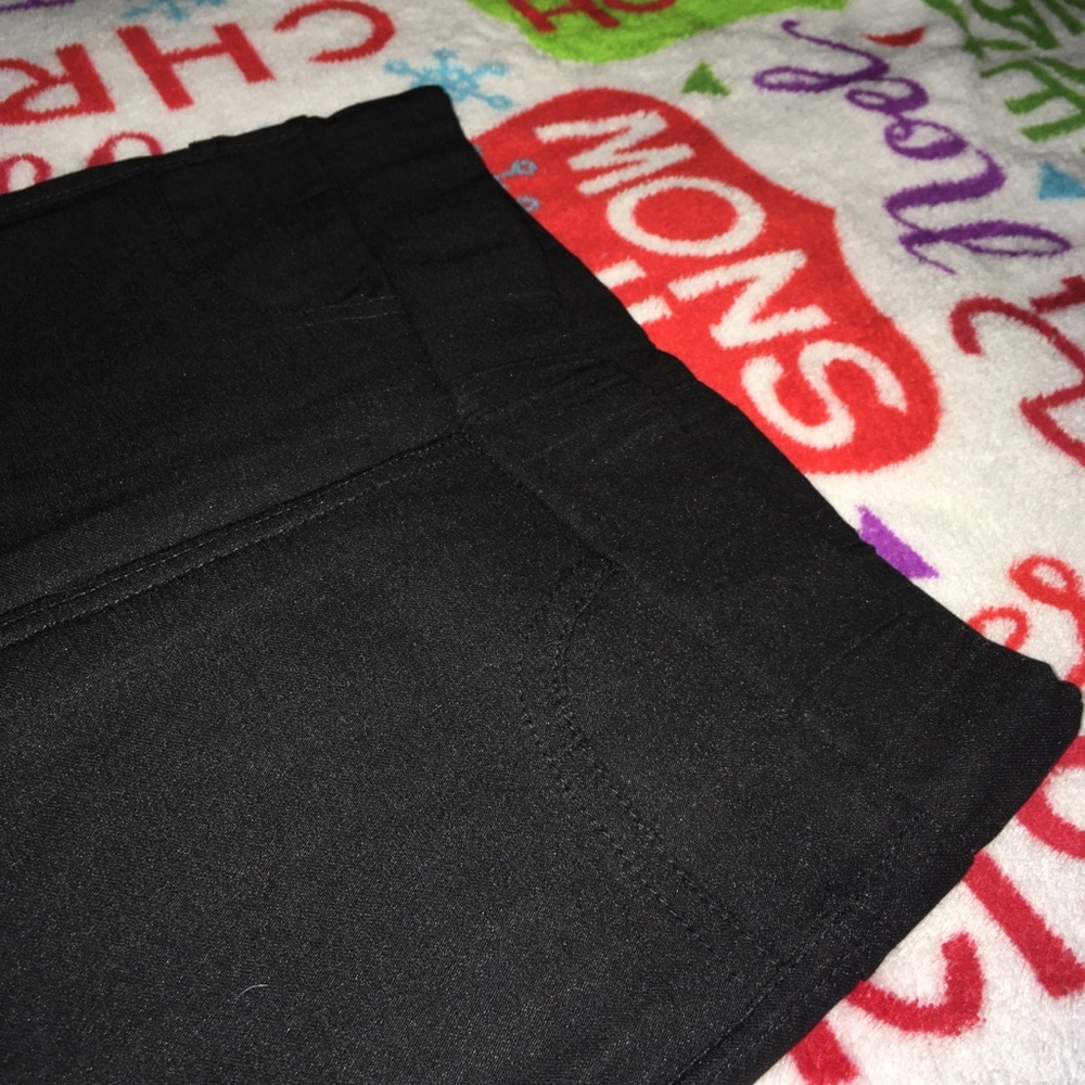 Yuan Xiu skin tight black pull on leggings